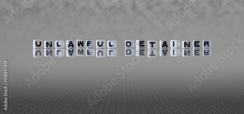 unlawful detainer word or concept represented by black and white letter cubes on a grey horizon background stretching to infinity