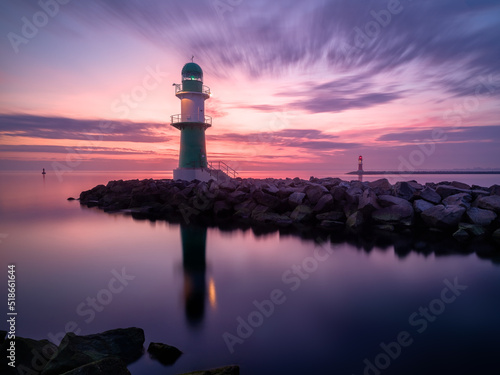 sunrise at the lighthouse in warnemuende
