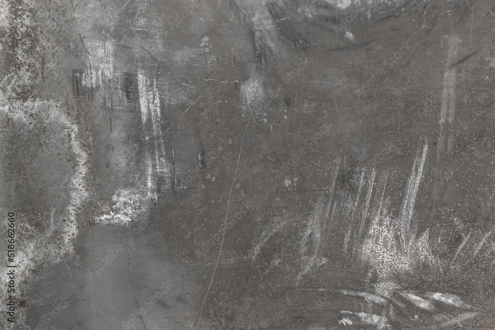 Dirty streaks of white and gray paint on the surface of old metal abstract steel pattern texture background grunge