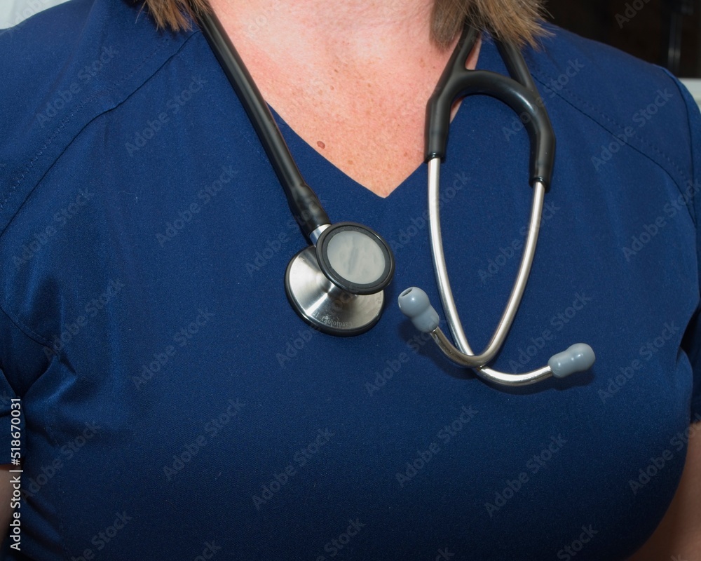Upper body shot of female Nurse with Stethoscope Upper body shot of female Nurse with Stethoscope