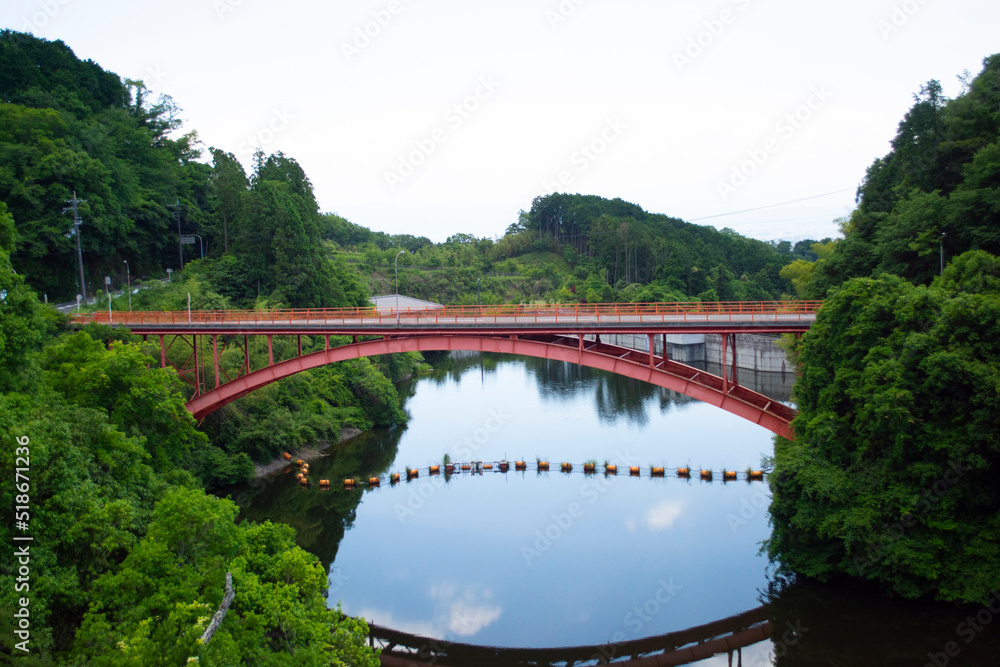 Bridge across river in green rainforest area in Japan in summer. Bridge across river in green rainforest area in Japan in summer.