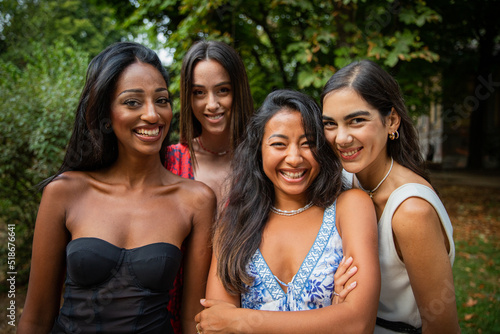 Portrait of a multiethnic group of girl friends outdoors, ethnic diversity concept.