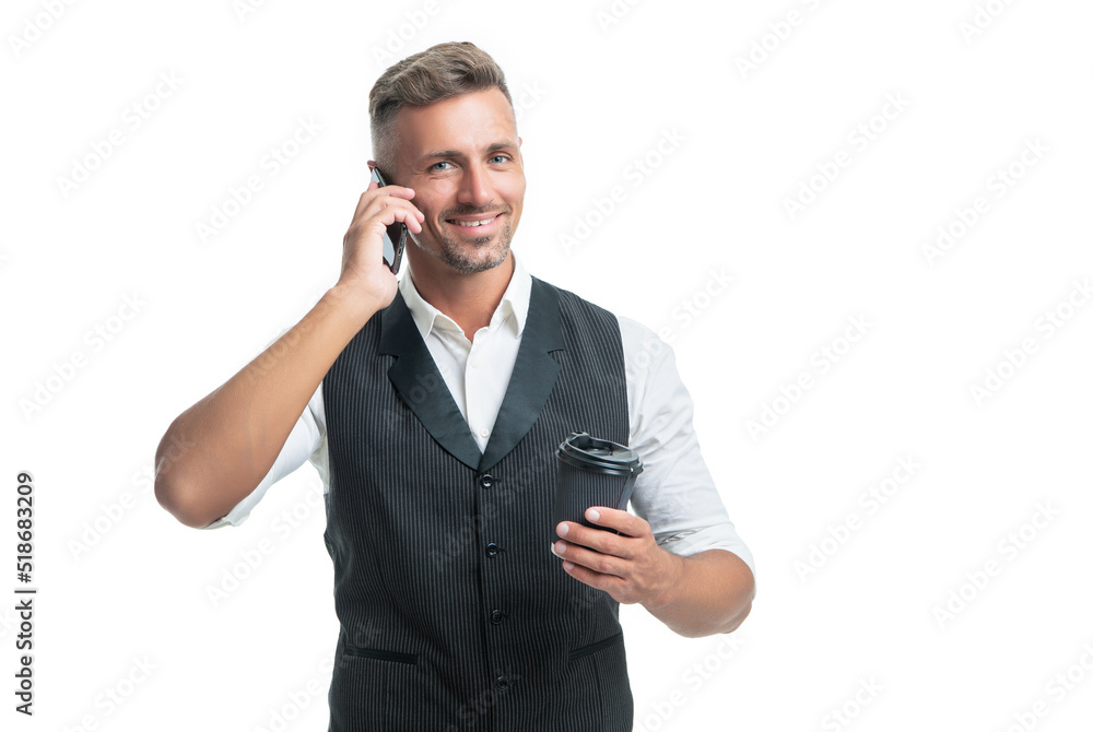 Happy professional guy talking on mobile phone during tea break isolated on white Happy professional guy talking on mobile phone during tea break isolated on white