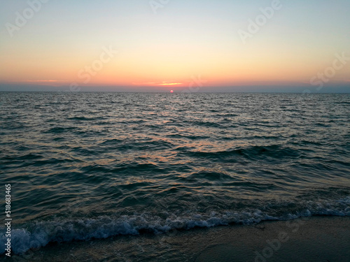 Incredibly beautiful sunset on the beach in Thailand. Sun  sky  sea  waves and sand. A holiday by the sea