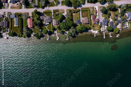 wassage beach looking down at shoreline water and houses in view 