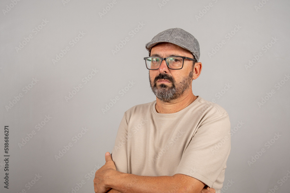 Portrait of charming mature man feel true content emotions wearing beige shirt isolated Portrait of charming mature man feel true content emotions wearing beige shirt isolated