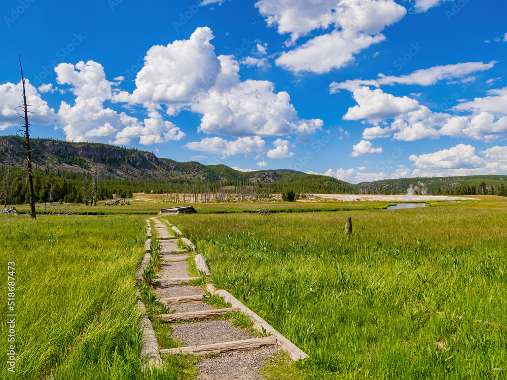 Sunny view of the landscape of Mystic Falls trail