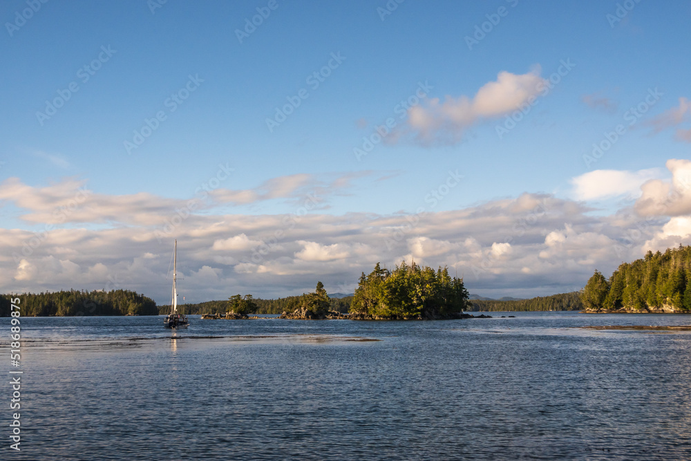 Crusing the Inland Passage: a yacht anchored in Heiltsuk Territory on the Central Coast of British Columbia in evening light. Crusing the Inland Passage: a yacht anchored in Heiltsuk Territory on the Central Coast of British Columbia in evening light.