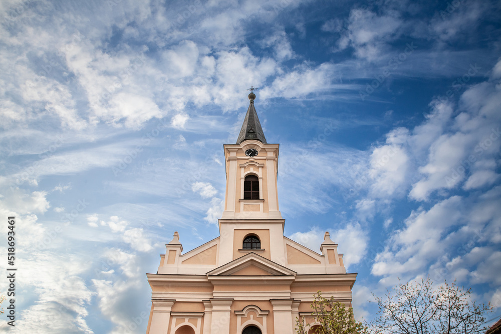 Panorama of the Catholic church of Saint Peter and Paul in Indjija also called rimokatolicka crkva svetog petra i pavla, a major landmark of Indij, a city in the Serbian province of Vojvodina