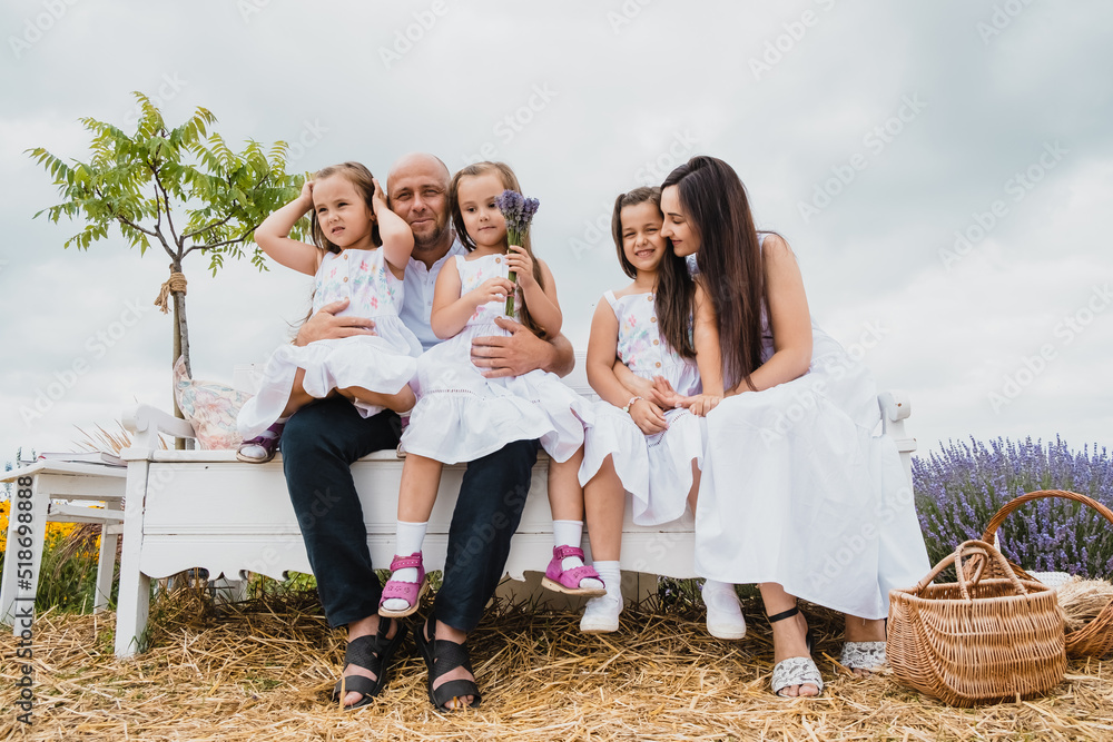 Happy dad and mom hug their adorable children. Portrait of cheerful happy family. High quality video 4k. Happy dad and mom hug their adorable children. Portrait of cheerful happy family. High quality video 4k.