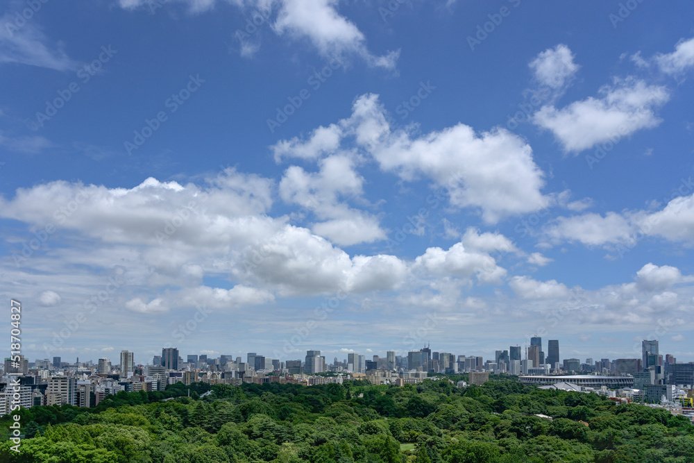 blue sky and clouds over the city