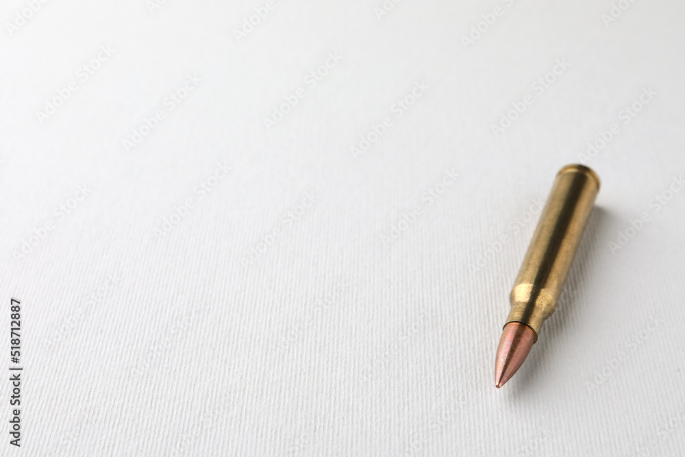 Bullet on white background, closeup. Space for text Bullet on white background, closeup. Space for text