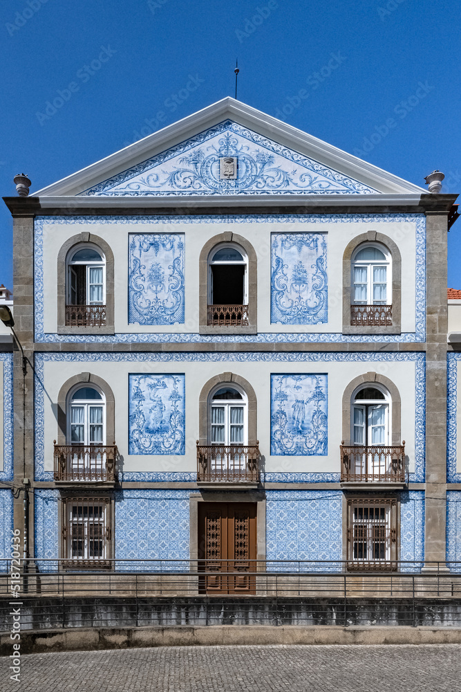 Aveiro, beautiful city in Portugal, old blue house with azulejos, on the canal, in the historical center
