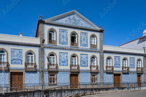 Aveiro, beautiful city in Portugal, old blue house with azulejos, on the canal, in the historical center
