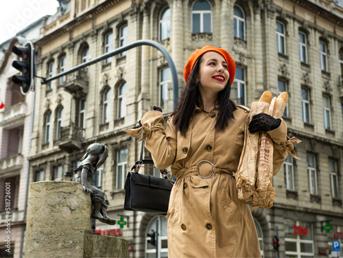 A girl in a coat and beret in the French style