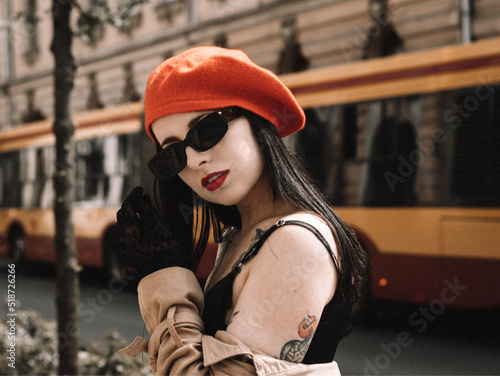 A girl in a coat and beret in the French style