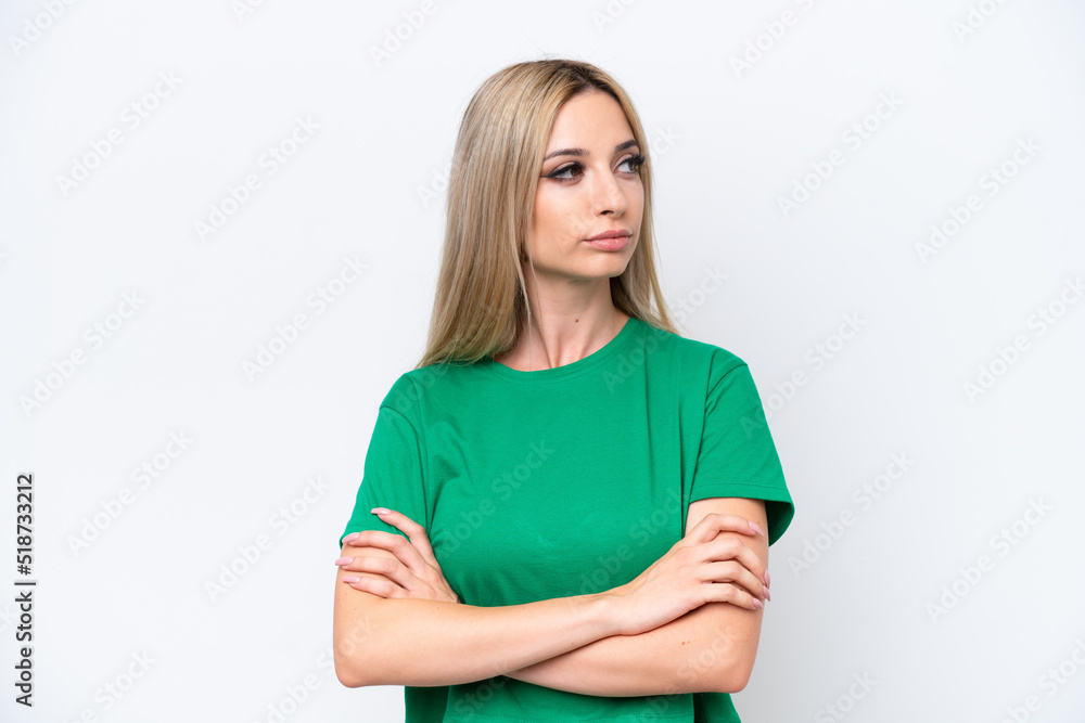 Pretty blonde woman isolated on white background looking to the side Pretty blonde woman isolated on white background looking to the side