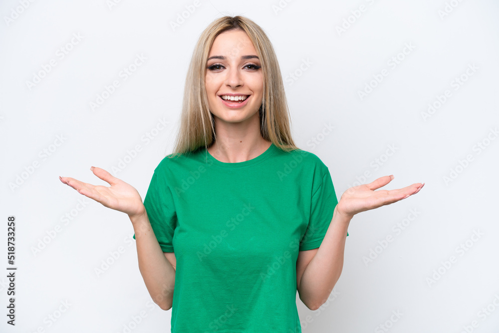Pretty blonde woman isolated on white background with shocked facial expression Pretty blonde woman isolated on white background with shocked facial expression