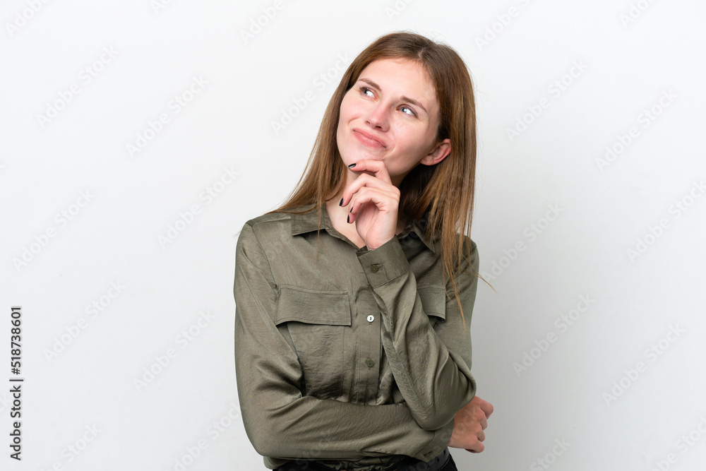 Young English woman isolated on white background and looking up Young English woman isolated on white background and looking up