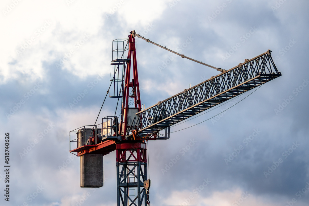 Construction crane against sky. Construction industry concepts.