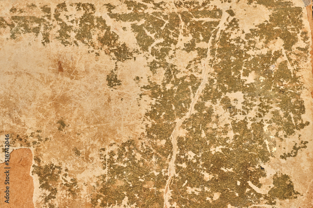 Weathered paper background from old book cover. grunge cloth texture