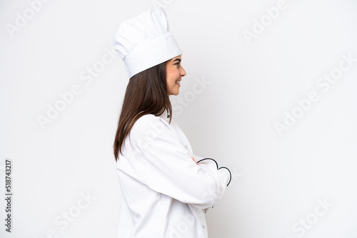 Young Brazilian chef woman isolated on white background in lateral position photo
