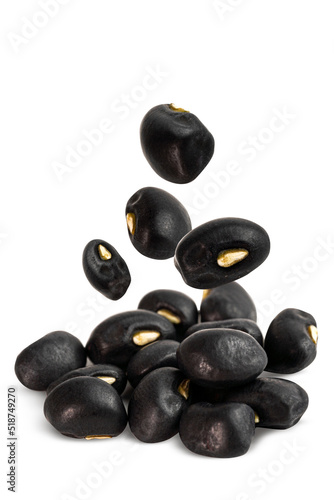 Falling Black Beans isolated on white background photo