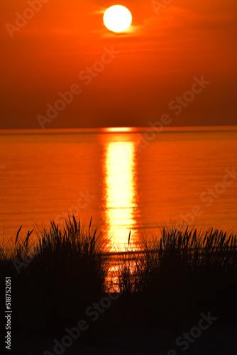 Stunning deep orange sunset over Maasvlakte  Netherlands