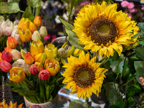 A beautifully made fake two sunflowers stored for sale in an interior store.
