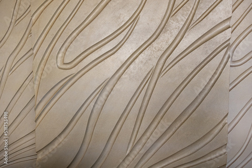 An abstract texture of wavy and intercrossing bright bronze lines of dry canals. photo