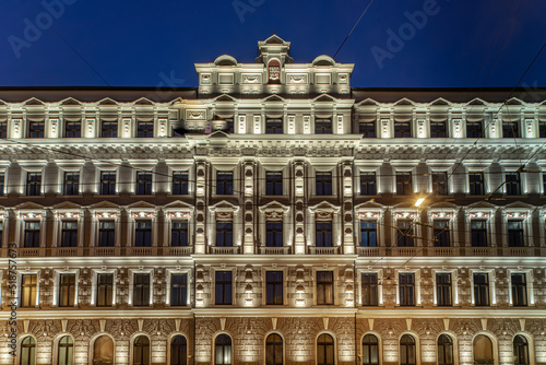Night cityscape of Riga. Modern illuminated residential building.