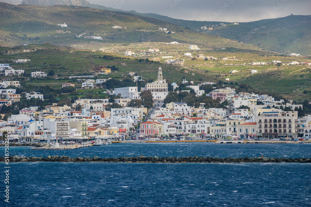 Beautiful view of the island of Tinos from the deck of a ferry boat in Sporades, Greece