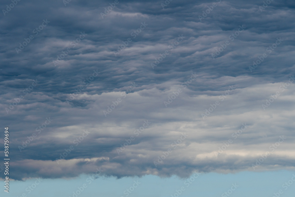 A bright hole in a swirl of dark clouds. A bright hole in a swirl of dark clouds.