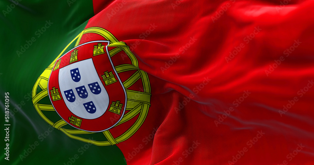 Close-up view of Portugal national flag waving in the wind Close-up view of Portugal national flag waving in the wind