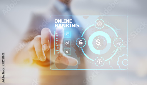Online banking e-banking digital finance technology. Businessman pressing button on screen. photo