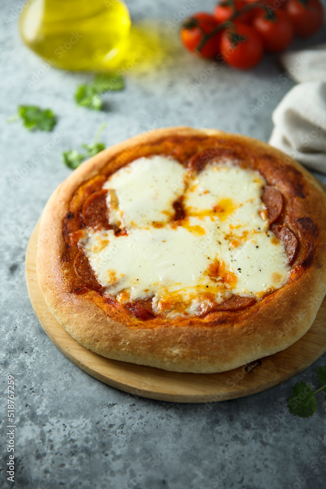 Homemade pizza with mozzarella cheese Homemade pizza with mozzarella cheese