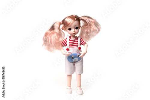 Ceramic toy doll isolated on white background.