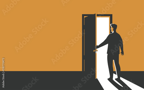 The man opens the door. The concept of mystery or new opportunities or the path to the future.