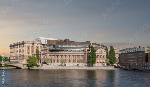 Riksdagshuset, the Swedish Parliament House, located on the island of Helgeandsholmen, Old town, or Gamla Stan, Stockholm, Sweden, in a summer day photo