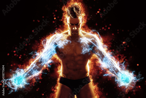 Brutal strong athletic Bodybuilder posing. Fire and spark explosion in the background. © zamuruev