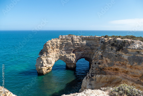 Natural Arch of Marinha Beach during low tide. Landmark in Lagoa, Algarve. Portugal. © Afonso Farias