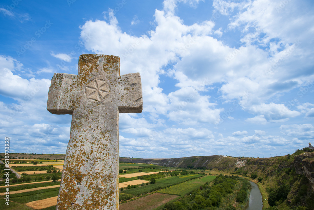 a cross above the valley by old Orhei (Orheiul Vechi), Moldova a cross above the valley by old Orhei (Orheiul Vechi), Moldova