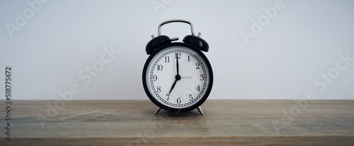 Analog alarm clock pointing at hours, minutes, seconds to display time - Photo of digital timer for website, deadline, illustration, banner, meeting - 7 am 7 pm 7am 7pm 19h 19