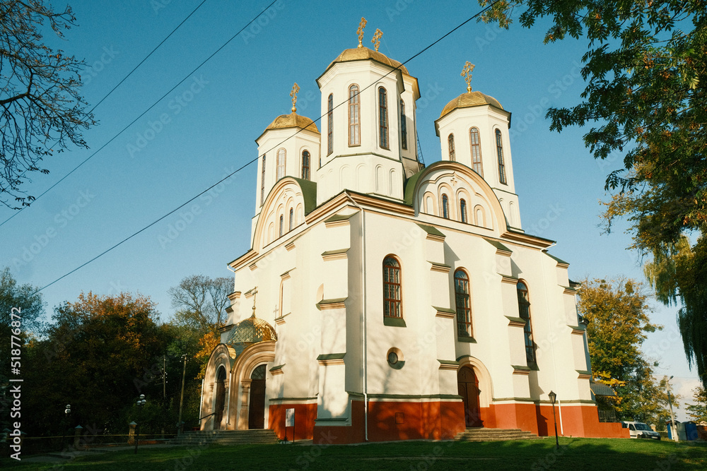 Fototapeta premium The old church on the territory of the castle. Fortified Orthodox Church to protect the people and blue sky