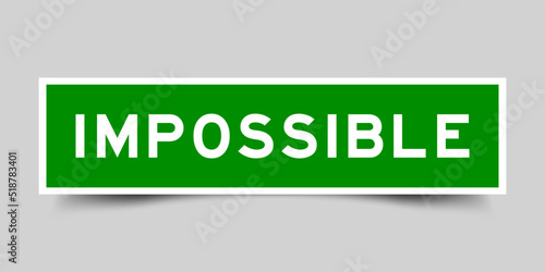 Sticker label with word impossible in green color on gray background