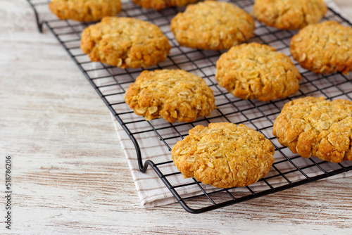 Homemade oat cookies on rack photo