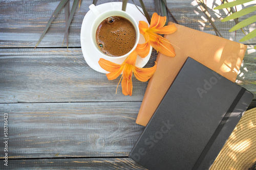 Morning mock up with coffee and notebooks on a wooden table, flat lay