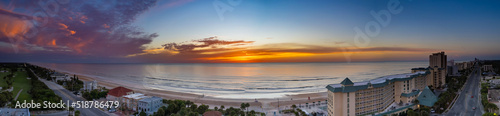 Aerial drone photo of the shore in Ormond Beach, Florida at sunrise