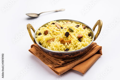 Kashmiri sweet modur pulao made of rice cooked with sugar, water flavored with Saffron and dry fruits