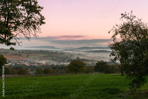 Sunrise over rolling hills and pastures in Southern Germany © mdurson